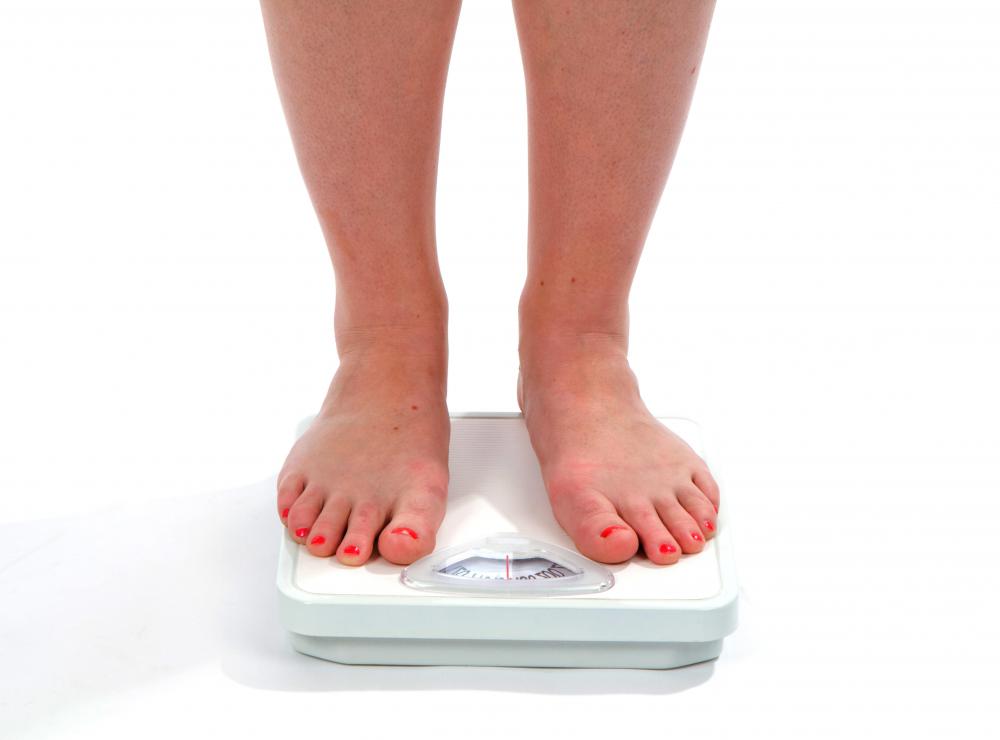 Weight loss can accompany hives as symptoms related to cancer.