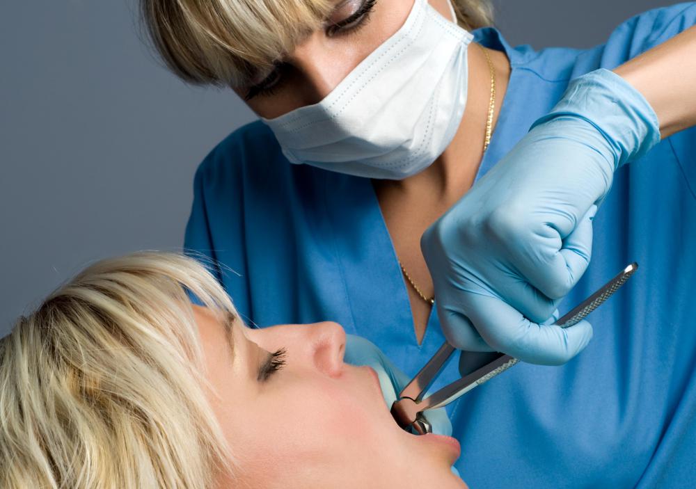 If a dental arch is too narrow, some teeth may need to be extracted.