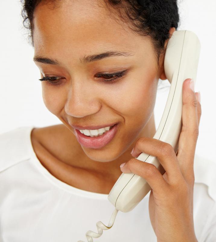 Dialing *67 before a phone number on a home phone is one way to make an anonymous call.