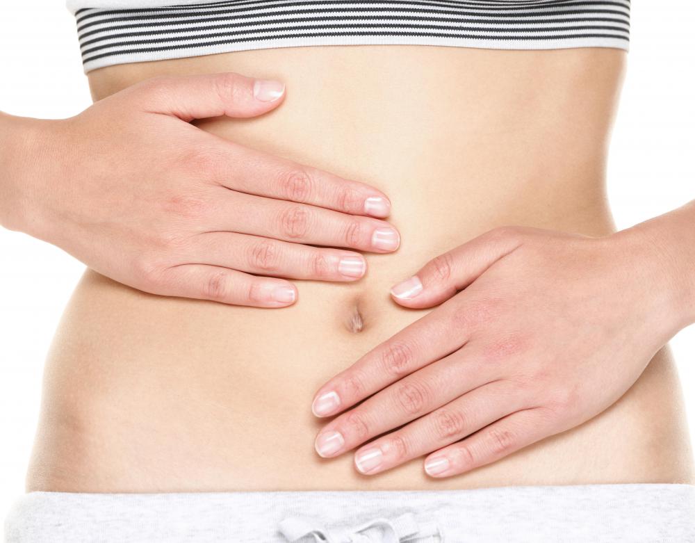 The linea nigra begins just above the pubic hair in the center and runs up to the belly button.