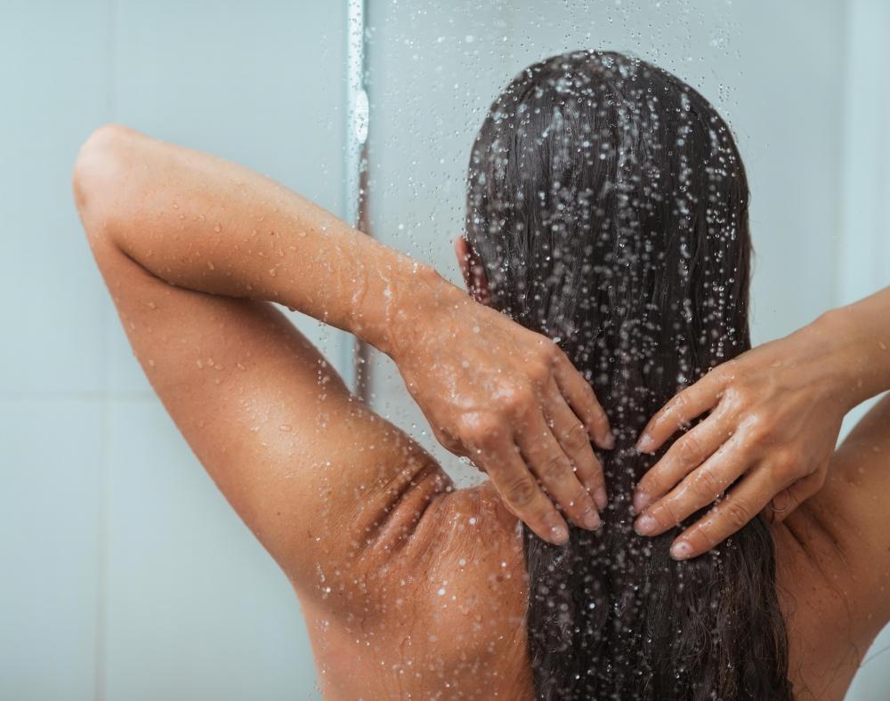 Avoiding showering in hot water may help promote skin elasticity and moisture.