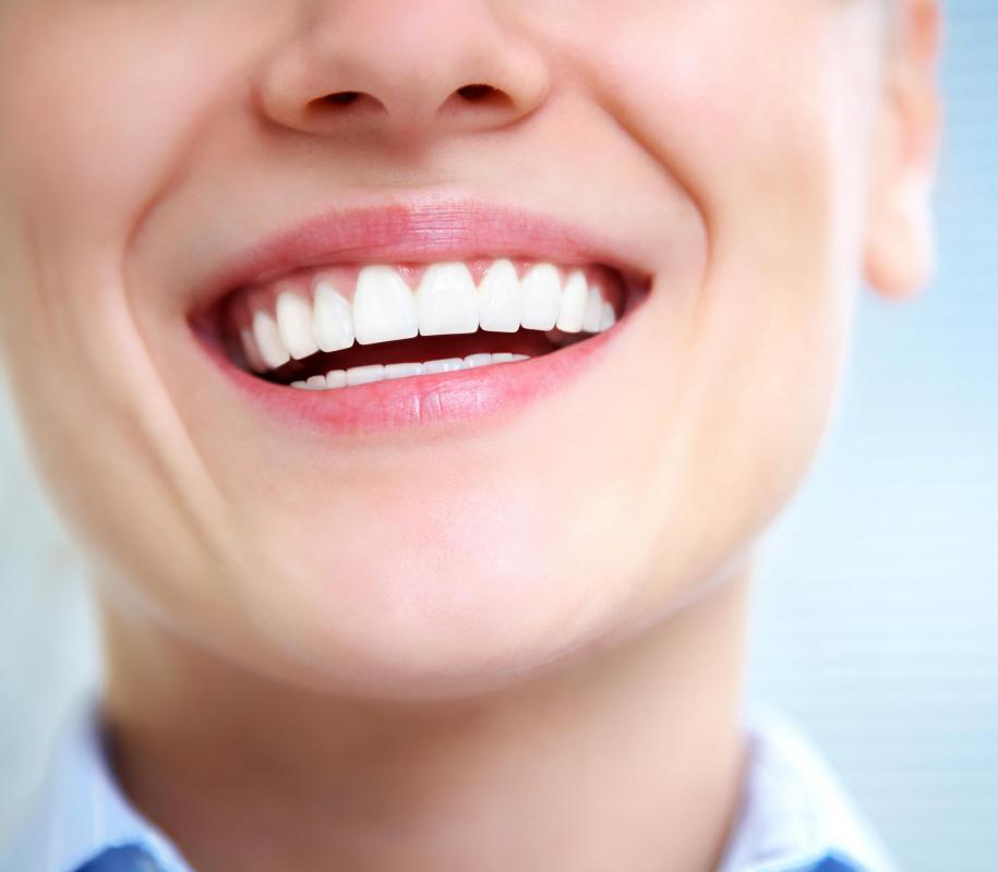 "Him" is the pronoun in the sentence, "Lily smiled down at him."