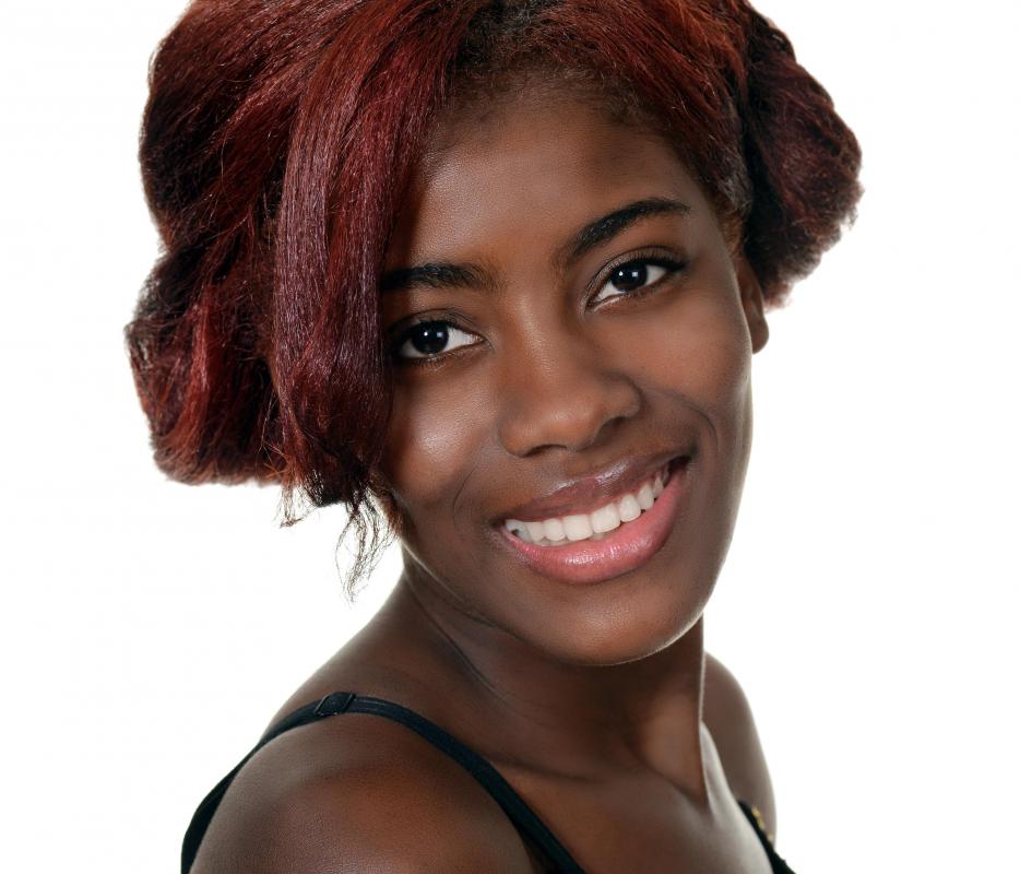 A white background brings out the subject in a headshot.
