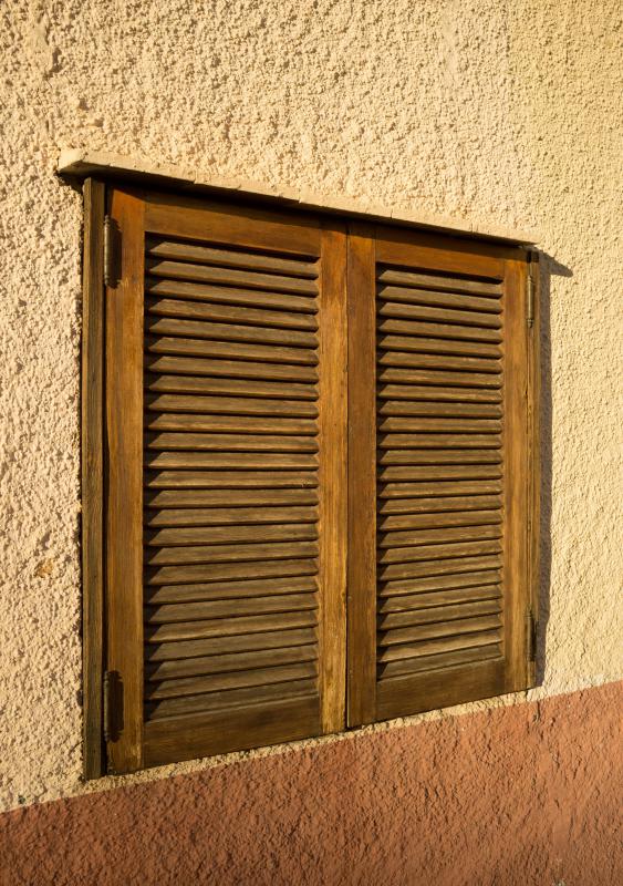 Textured paint with a grainy, stucco-like look.
