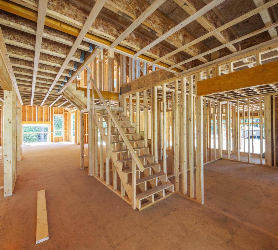 One of the most popular cuts of lumber for home building is the two-by-four, which actually measures 1.5 inches by 3.5 inches.