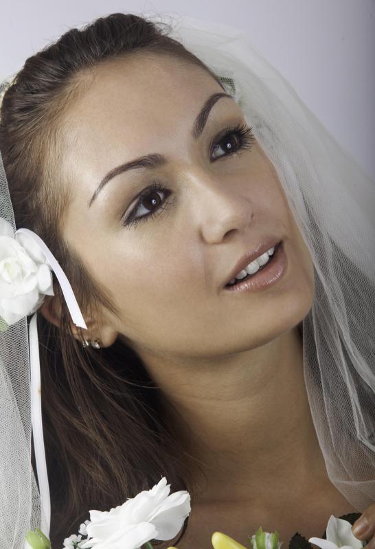 Stylists can help a bride get ready on her wedding day.