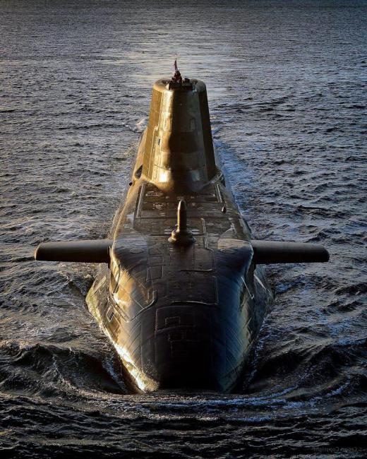 The dive planes on an Astute class submarine are located above the bow.