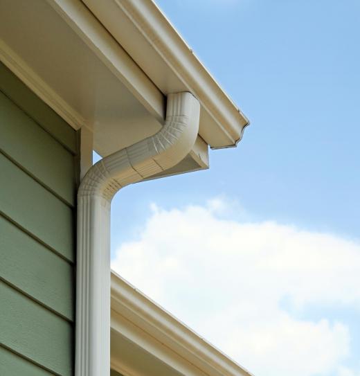 A home's downspout diverts water away from the gutter system.