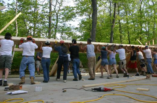 Many community projects require volunteers to help complete a project, such as the building of a new church or shelter.